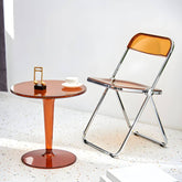 Scandinavian style dining chair with silver metal legs and plastic acrylic seat main product image